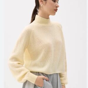 Cozy Cream Cowl Neck Sweater with Soft Texture